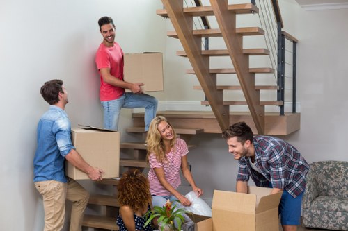 Packed boxes and furniture prepared for a Hampton Removals booking