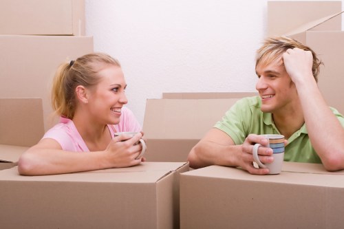 Professional movers loading furniture during Hampton house removals