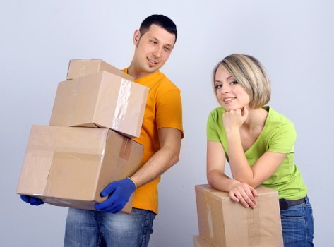 Loading boxes and furniture into a van for a Hampton relocation