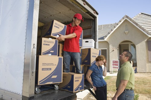 Professional flat removals Hampton team handling furniture