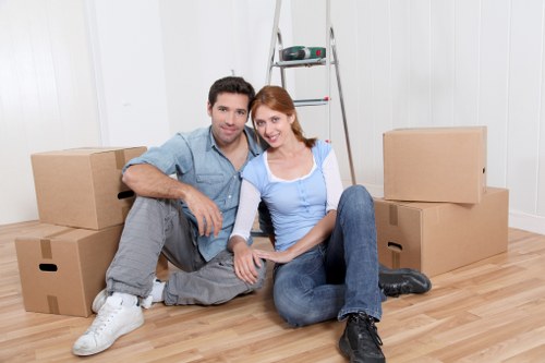 Professional movers handling office furniture and equipment in Hampton