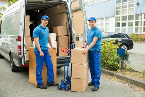 Loading boxes into a Hampton removal van
