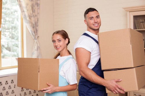 Packed boxes and furniture ready for storage in Hampton